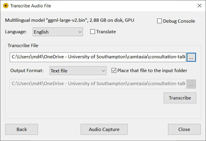 Screenshot of Whisper Desktop software with options to select input language, translate to another language and choose different output formats.